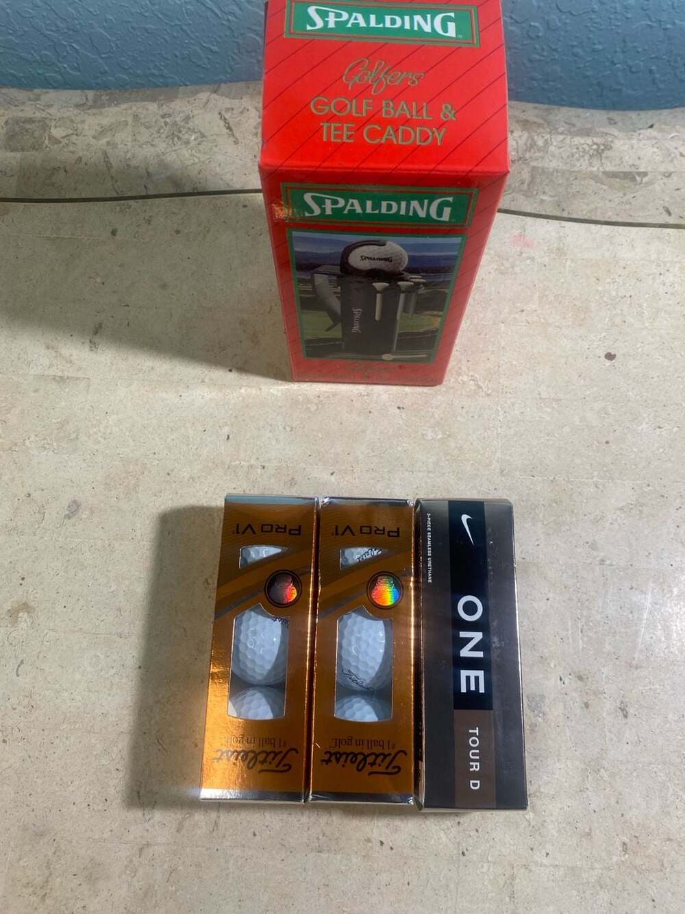 Golf Lot: 6 Titleist Pro V1 Balls, 3 Nike One Tour D Balls, Spalding Ball  Tee C